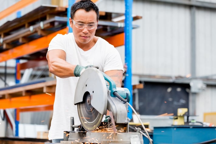 Asian worker in production plant on the factory floor.jpeg