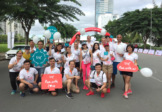 TRG and PJ's Coffee staff gave away flags and balloons